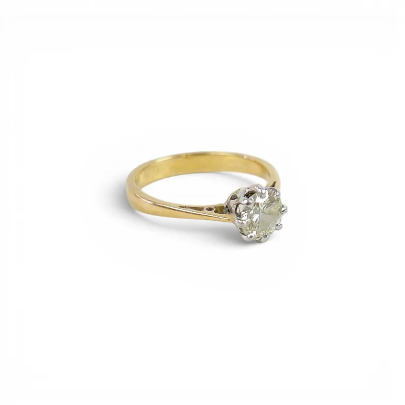 An 18CT Gold and Diamond Solitaire Ring