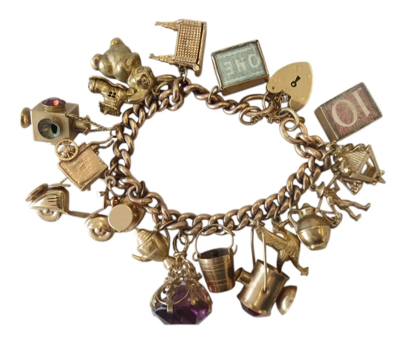 9ct Gold Charm Bracelet with padlock clasp and 17 charms 72.8g gross