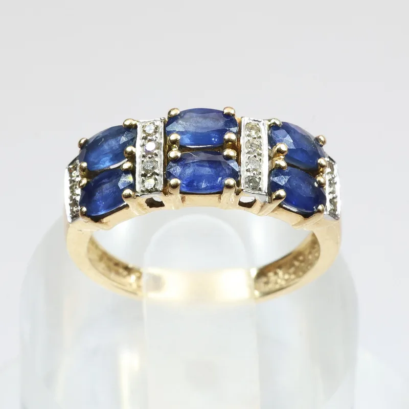 A Yellow Metal Sapphire and Diamond Ring, Tested As 14CT. Gold, 3.63 Grams