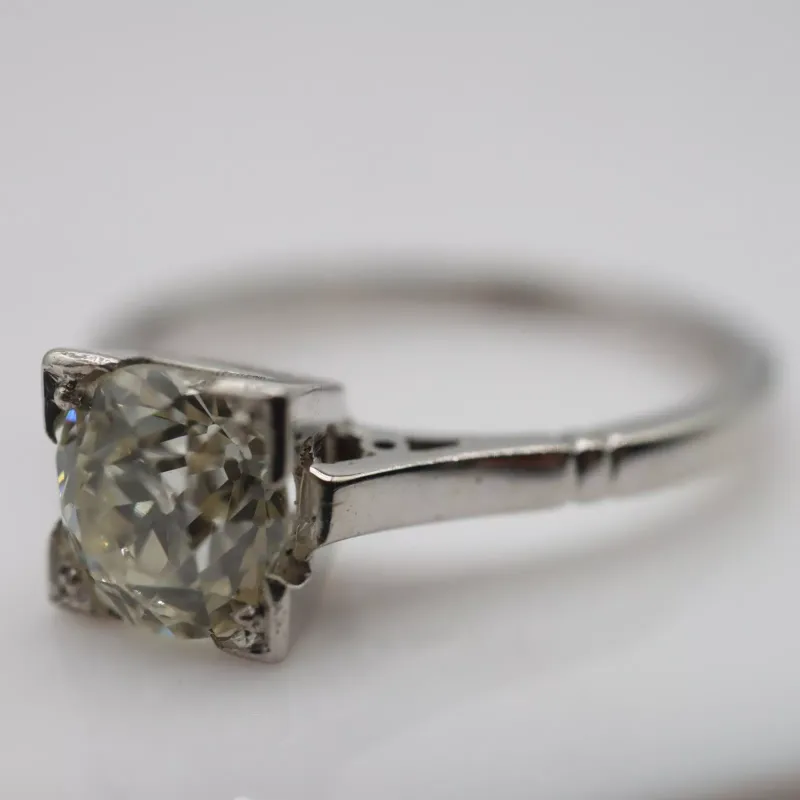 18ct white gold and platinum solitaire ring set with a 0.95cts old-cut diamond, size M/N, 2.9g, diamond