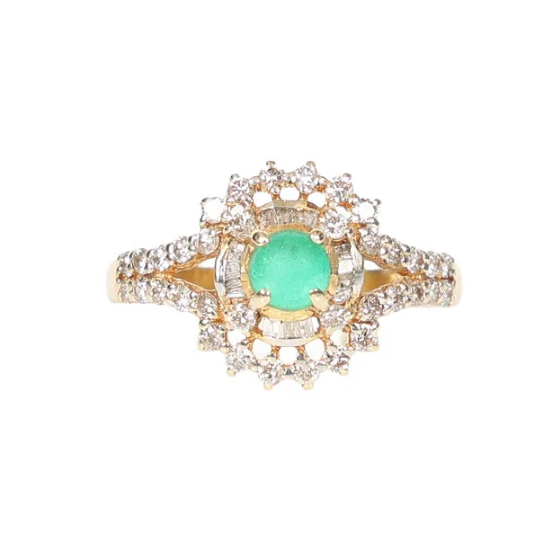 An Emerald and Diamond Ring