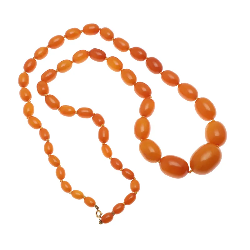 A Single Row Graduated Amber Bead Necklace