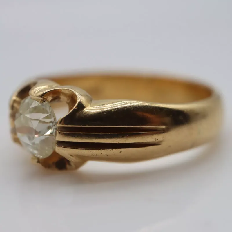 18ct gold wide-profile solitaire ring set with an old-cut 0.85cts diamond, size T